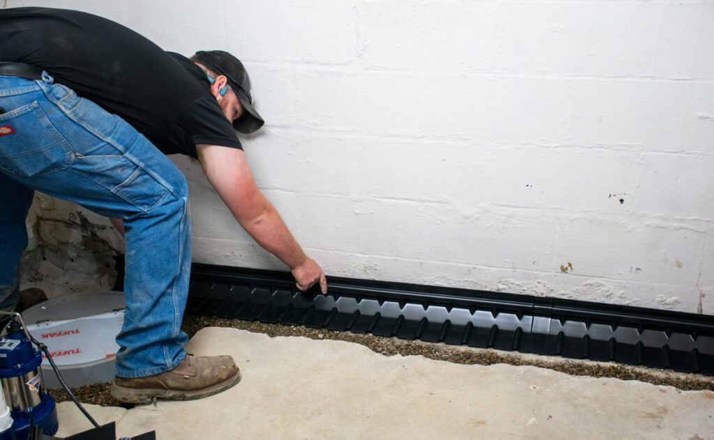 Installing interior floor drain system