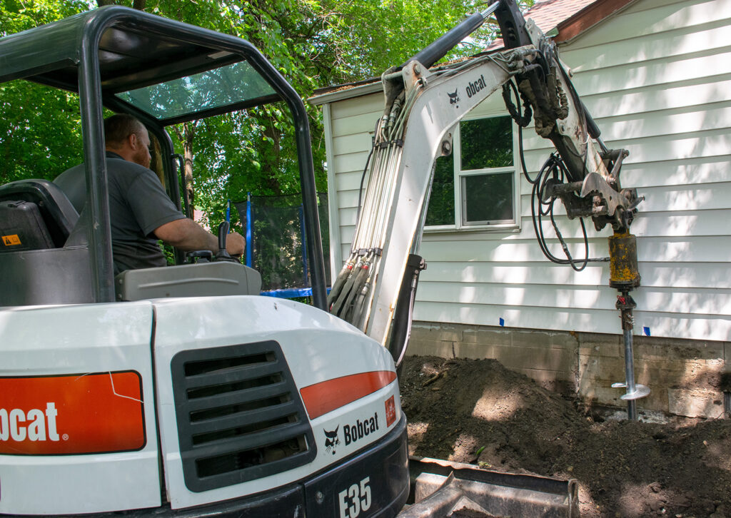 Helical Piers - Settling Foundation Repair
